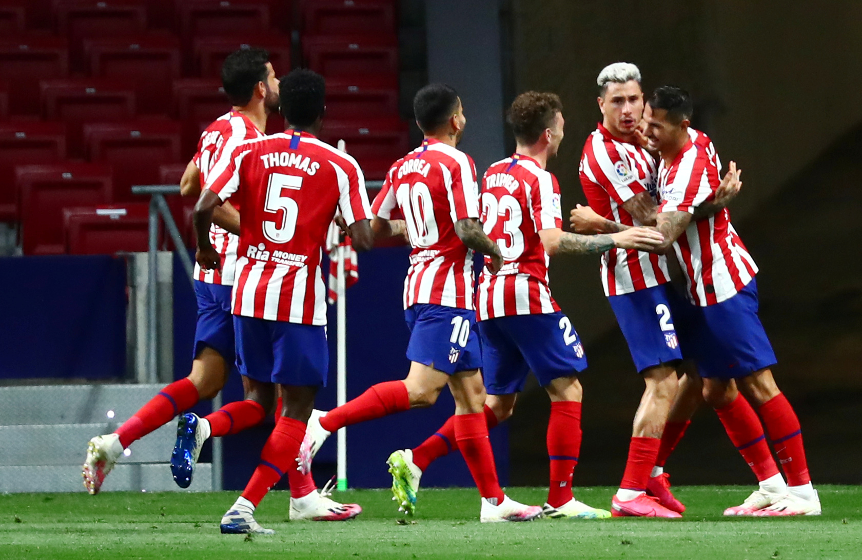 Atletico Madrid's Vitolo celebrates scoring their first goal with teammates, as play resumes behind closed doors following the outbreak of the coronavirus disease (COVID-19) during the La Liga Santander match between Atletico Madrid and Real Valladolid, at Wanda Metropolitano, in Madrid, Spain, on June 20, 2020. Photo: Reuters