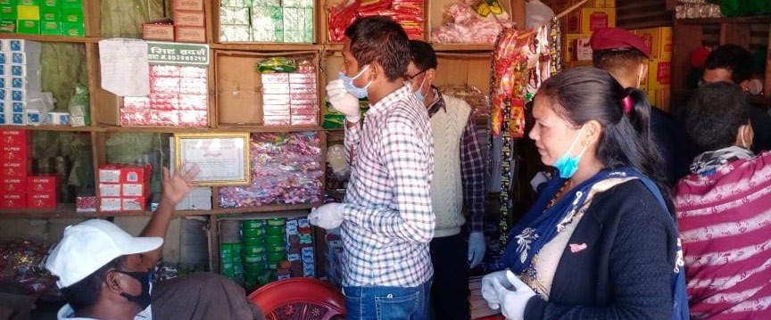 A market monitoring team led by Deputy Mayor Kamala Bista inspecting a grocery shop in Badimalika Municipality, Bajura, on Monday. Photo: THT