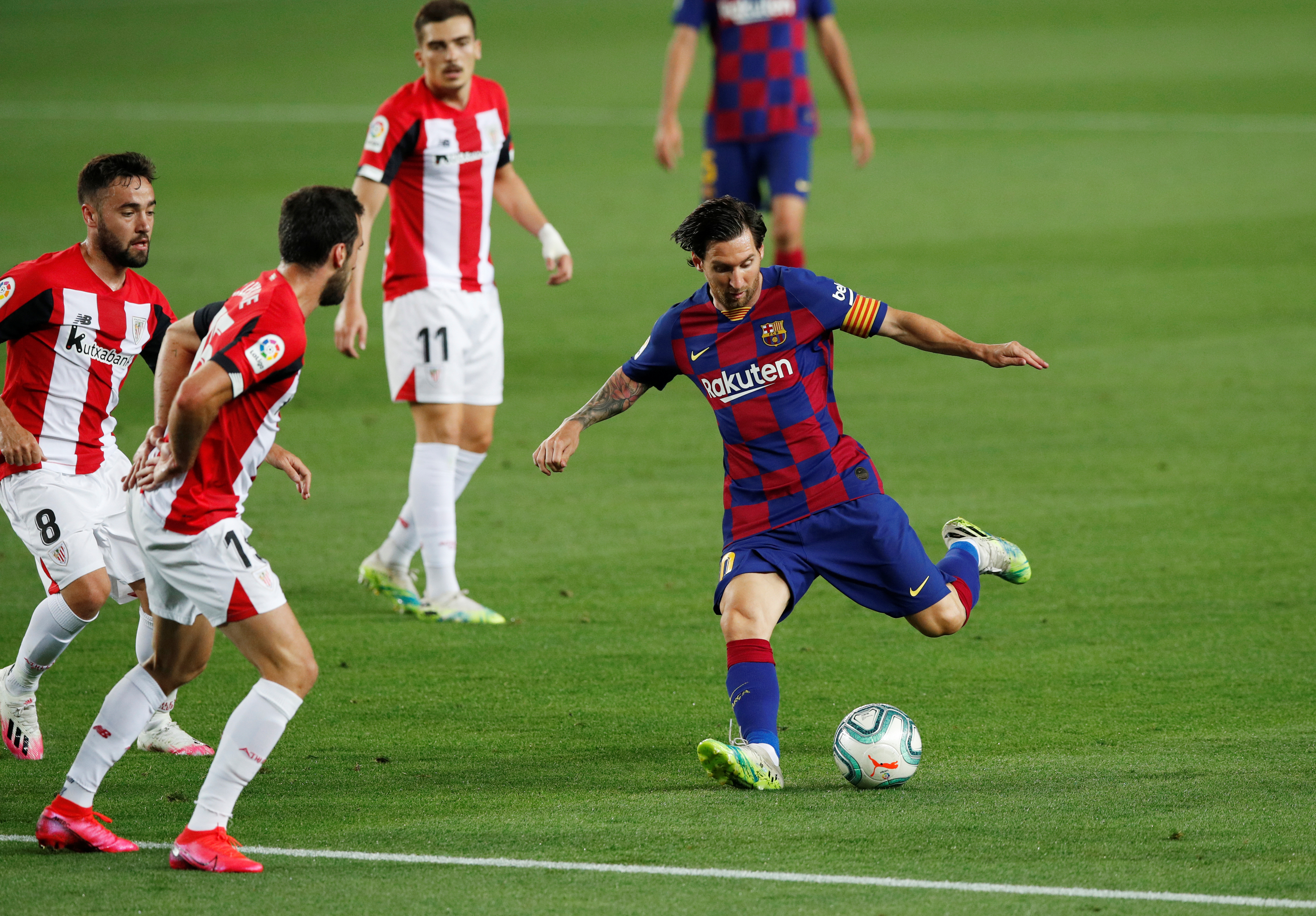Barcelona's Lionel Messi shoots at goal, as play resumes behind closed doors following the outbreak of the coronavirus disease (COVID-19) during the  La Liga Santander match between FC Barcelona n and Athletic Bilbao, at Camp Nou, in Barcelona, Spain, on June 23, 2020. Photo: Reuters