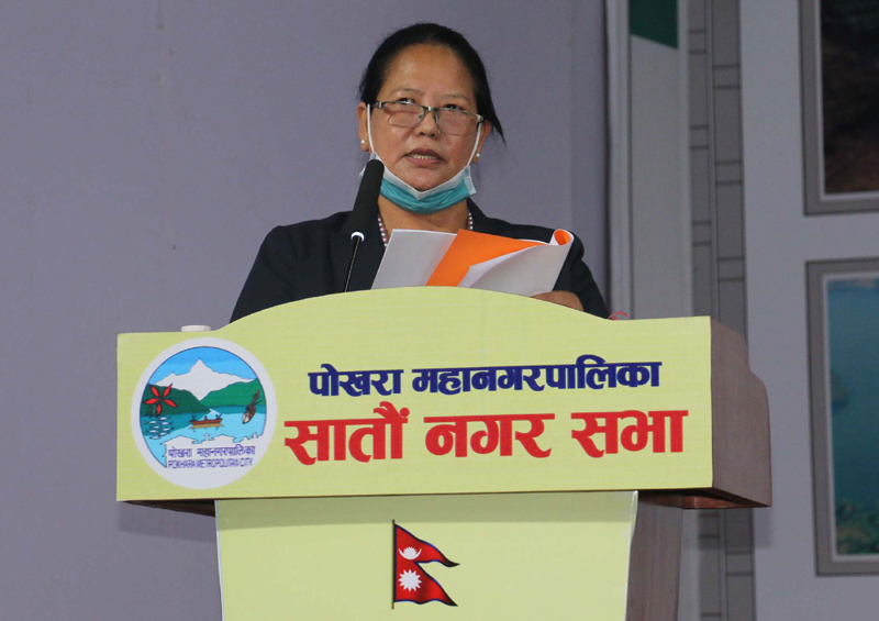 Deputy Mayor of Pokhara metropolis Manjudevi Gurung presenting the budget for the fiscal 2020-21 at the seventh municipal assembly, in Pokhara, on Wednesday. Photo:RSS