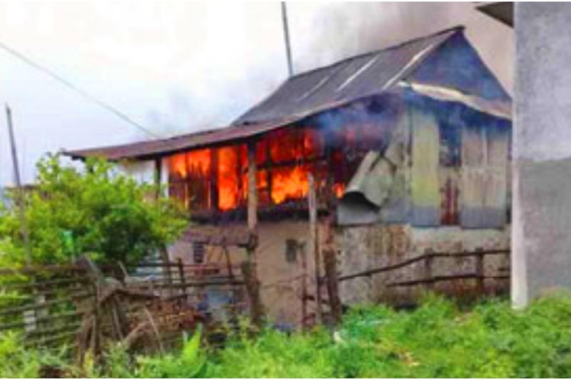 A view of Nar Bahadur Shresthau2019s house engulfed in flames, in Dharan sub-metropolis, on Thursday, June 4, 2020. Photo: THT
