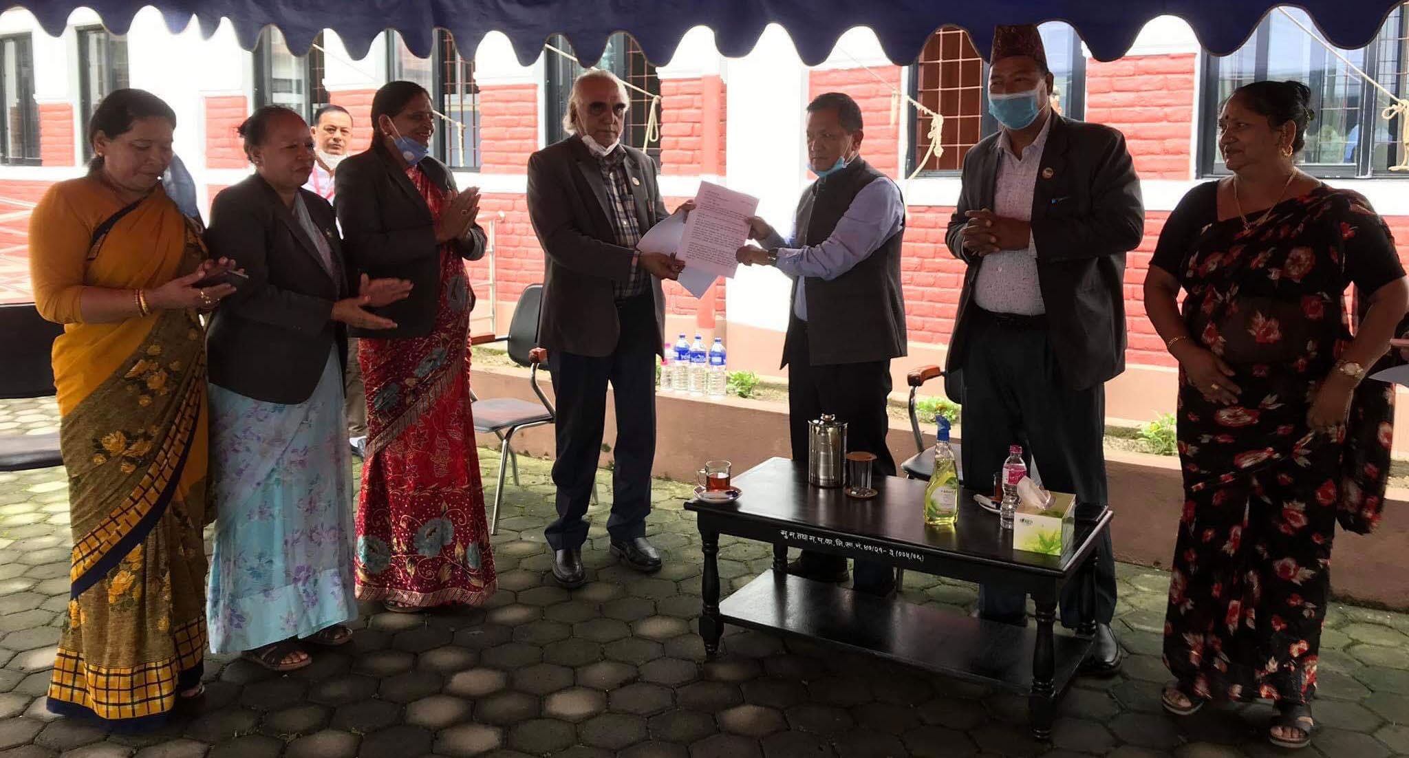 Gandaki Province Chief Minister Prithivi Subba Gurung receiving the memorandum submitted by Nepali Congress in Pokhara, on Tuesday. Photo: THT