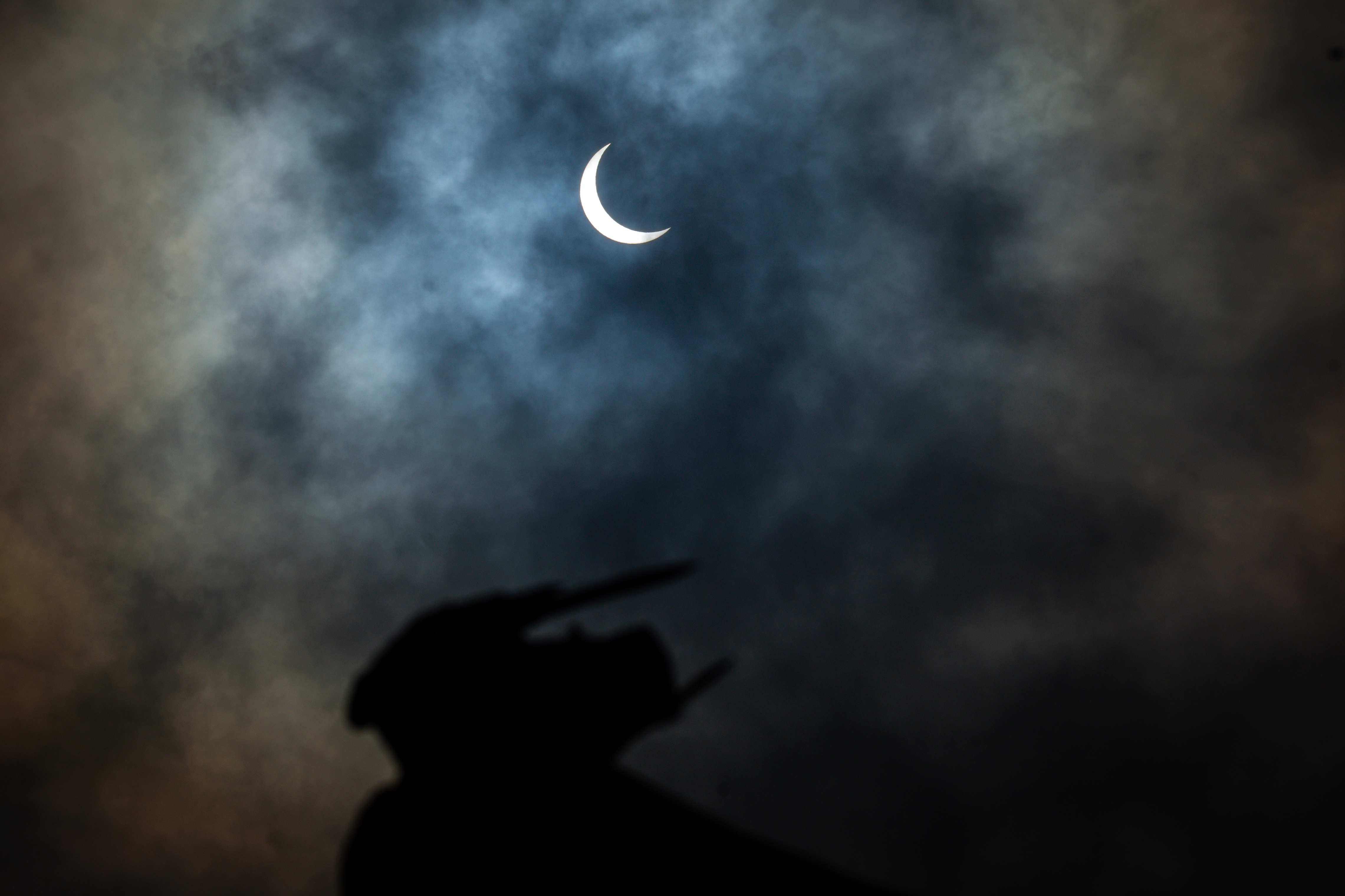 A partial solar eclipse is seen from Lalitpur on Sunday. Photo: Naresh Shrestha