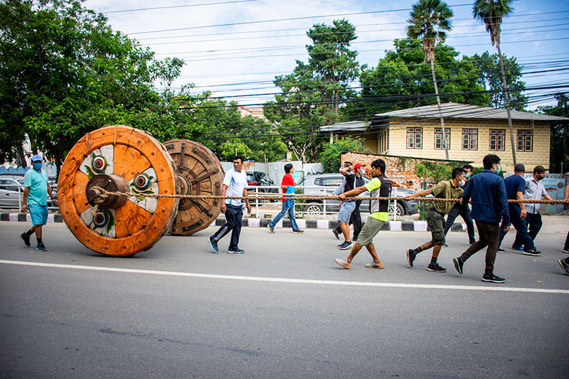 Members of Barahi Society pull the chariot of Rato Machhindranath in preparation for the upcoming chariot festival in Lalitpur, on Wednesday. Photo: Naresh Shrestha/THT