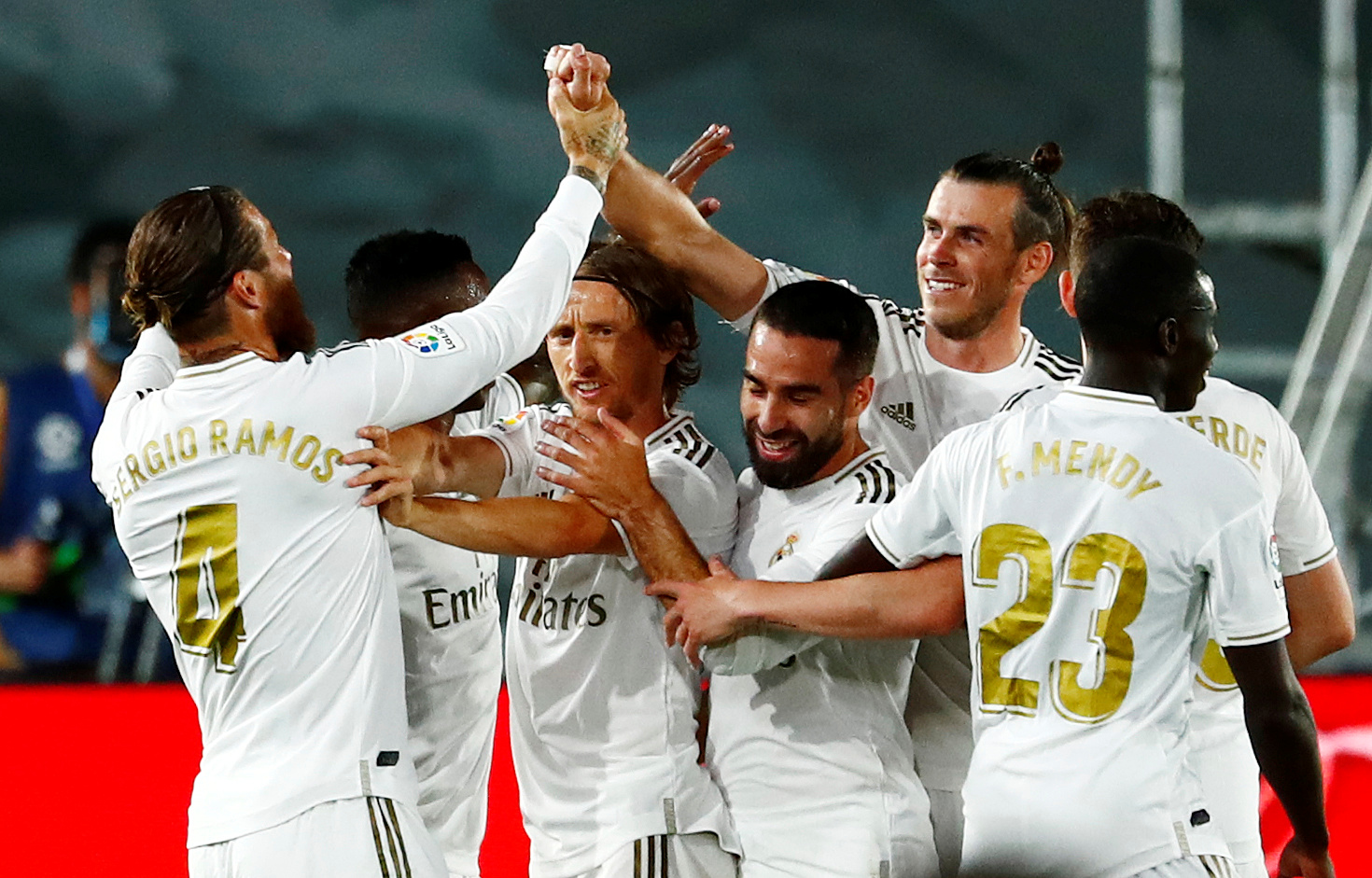Real Madrid's Sergio Ramos celebrates scoring their second goal with teammates, as play resumes behind closed doors following the outbreak of the coronavirus disease (COVID-19) during the  La Liga Santandermatch between Real Madrid and Real Mallorca, at  Alfredo Di Stefano Stadium, in Madrid, Spain, on June 24, 2020. Photo: Reuters