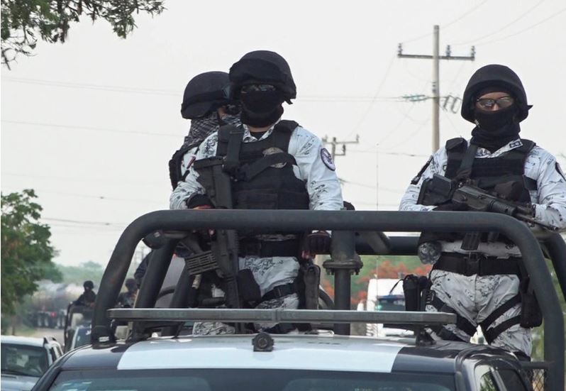 Members of the Mexico's National Guard patrol a road after assailants killed 15 inhabitants of an indigenous village, that has been plagued by local disputes, in San Mateo del Mar, in Oaxaca state, Mexico June 22, 2020. Photo: Reuters