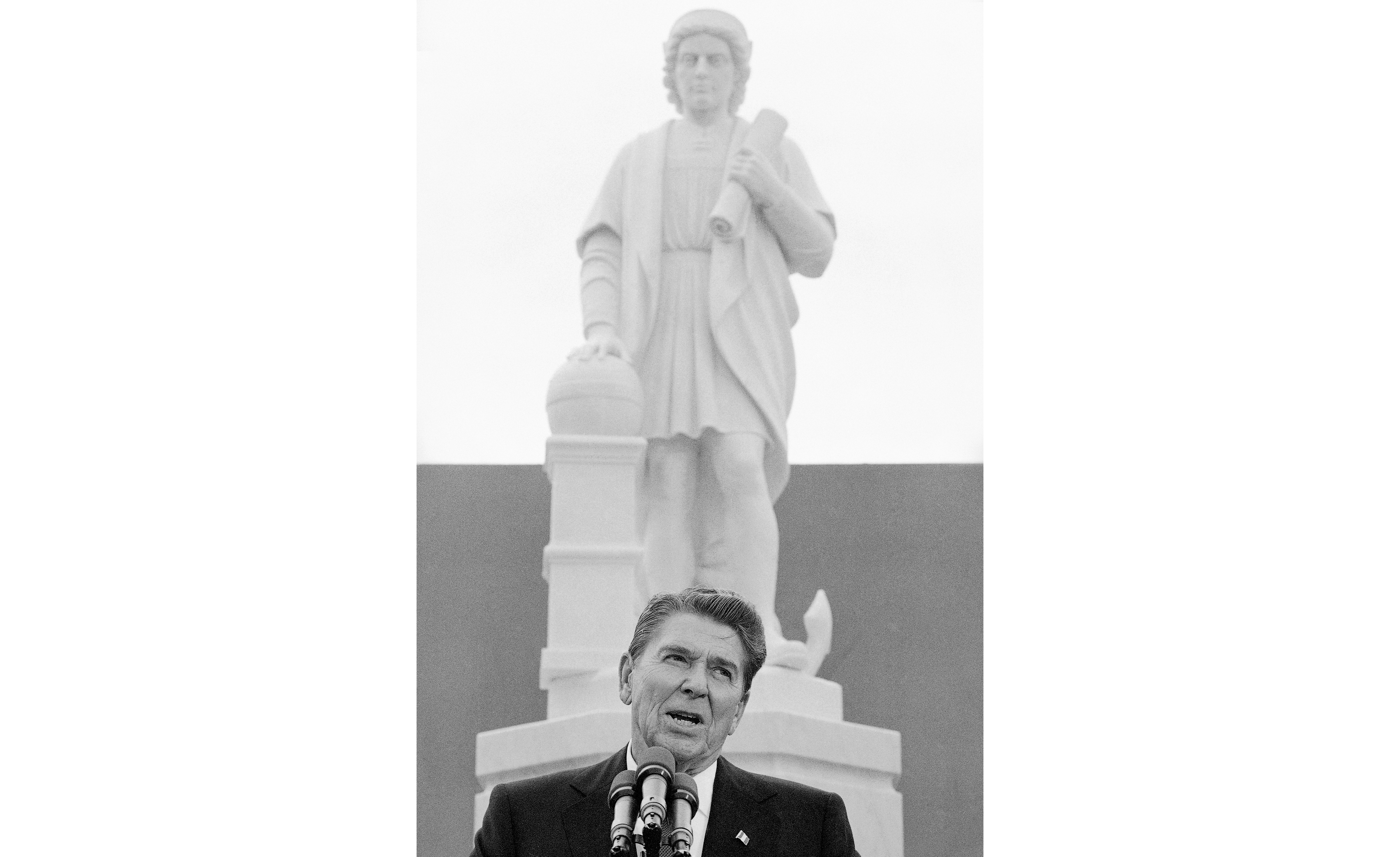 FILE - In this Monday, Oct. 9, 1984, file photo, President Ronald Reagan addresses a ceremony in Baltimore, to unveil a statue of Christopher Columbus. Baltimore protesters pulled down the statue of Christopher Columbus and threw it into the city's Inner Harbor, Saturday, July 4, 2020.  Photo: AP