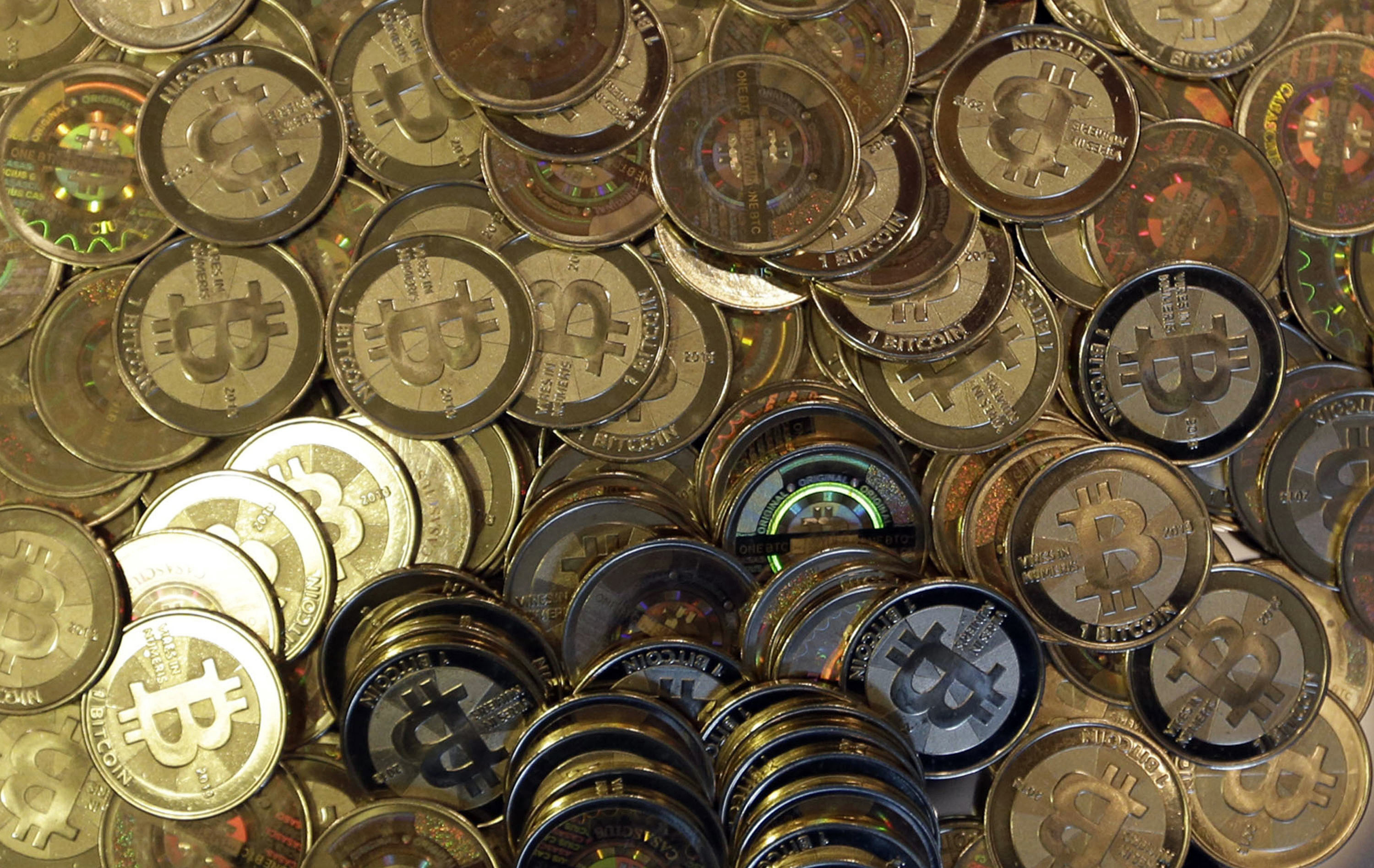FILE - This April 3, 2013, file photo shows bitcoin tokens in Sandy, Utah. Unidentified hackers broke into the Twitter accounts of technology moguls, politicians, celebrities and major companies Wednesday, July 15, 2020, in an apparent Bitcoin scam. Photo: AP