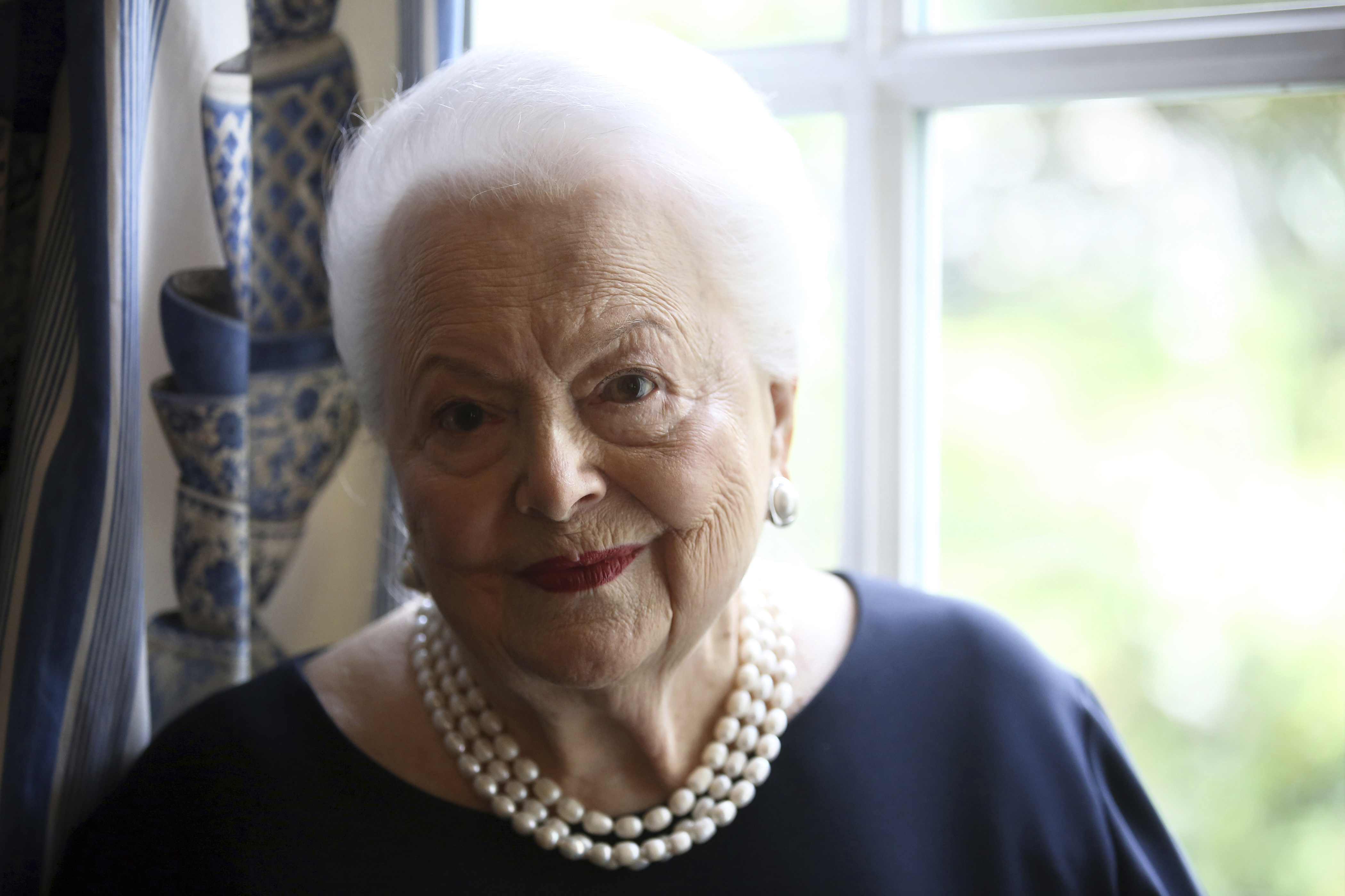 FILE - In this June 18, 2016, file photo, U.S. actress Olivia de Havilland poses during an Associated Press interview, in Paris. Olivia de Havilland, Oscar-winning actress has died, aged 104 in Paris,  publicist says Sunday July 26, 2020. Photo: AP