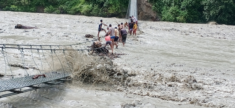 Suspension bridge at Budhiganga River, Taprisera, Bajura, Frifay, July 10, 2020. Photo: Prakash Singh/Bajura
