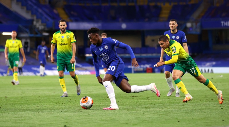 Chelsea's Callum Hudson-Odoi in action with Norwich City's Emiliano Buendia, as play resumes behind closed doors following the outbreak of the coronavirus disease (COVID-19) during the Premier League match between Chelsea and Norwich City, Stamford Bridge, in London, Britain, on  July 14, 2020. Photo: Pool via Reuters