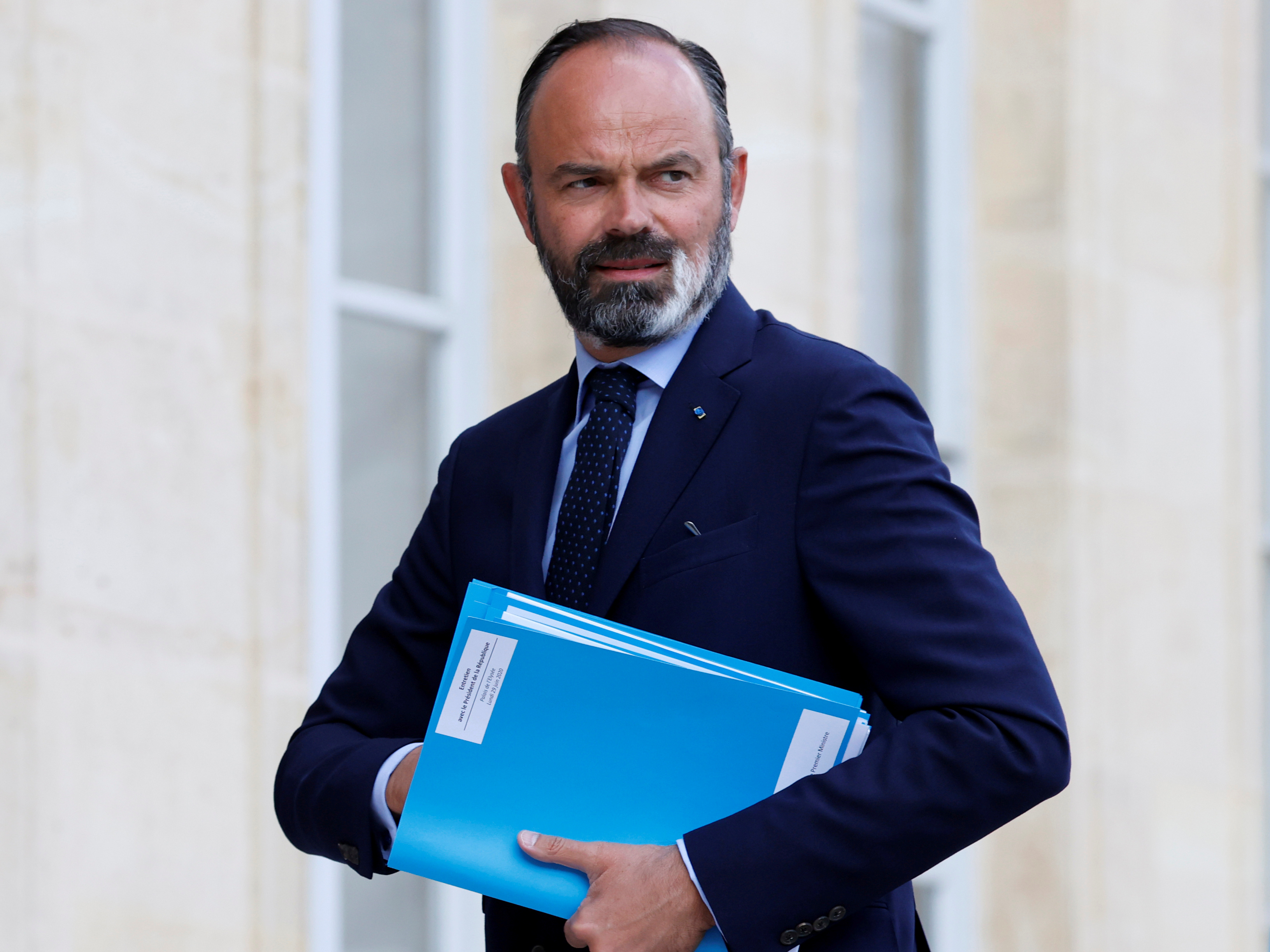 FILE PHOTO: French Prime Minister Edouard Philippe arrives for a meeting with members of the Citizens' Convention on Climate (CCC) at the Elysee Palace in Paris, France June 29, 2020. REUTERS/Christian Hartmann/File Photo