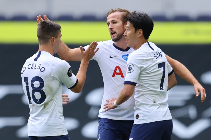 Tottenham Hotspur's Harry Kane celebrates scoring their second goal with Son Heung-min and Giovani Lo Celso, during the Premier League match at Tottenham Hotspur and Leicester City, at Tottenham Hotspur Stadium, in London, Britain, on July 19, 2020, as play resumes behind closed doors following the outbreak of the coronavirus disease (COVID-19). Photo: Pool via R