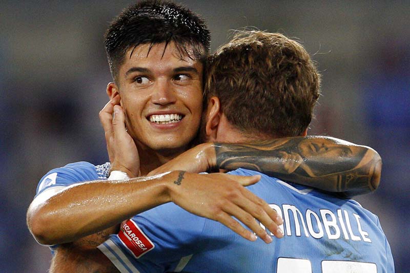 Lazio's Ciro Immobile( right) celebrates with teammate Joaquin Correa after scoring his sides second goal during the Serie A soccer match between Lazio and Brescia, at Rome's Olympic Stadium, Wednesday, July 29, 2020. Photo: AP