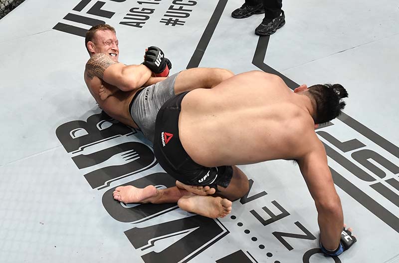 Jack Hermansson of Sweden secures a heel hook submission against Kelvin Gastelum in their middleweight bout  during UFC Fight Night at the Flash Forum on UFC Fight Island, Abu Dhabi, UAE, on July 19, 2020.  Photo: Jeff Bottari/Zuffa LLC via USA TODAY Sports via Reuters