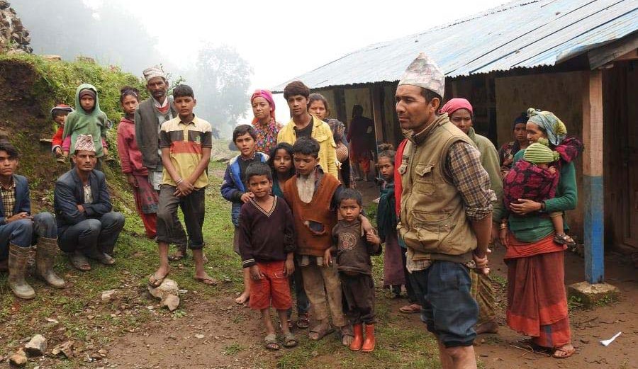 Families displaced due to landslides and other calamities caused by incessant rainfall waiting for relief materials in Kalakholi, Barekot Rural Municipality, Jajarkot, on Tuesday. Photo: THT