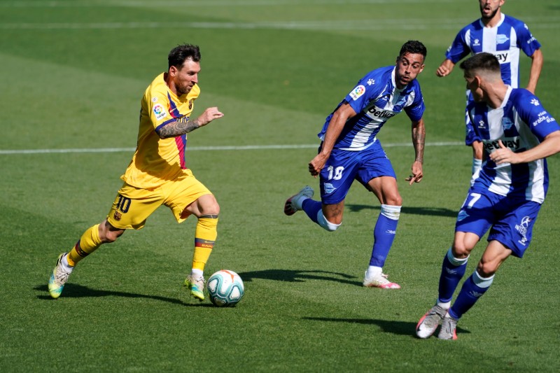 Barcelona's Lionel Messi in action during the La Liga Santander match between Deportivo Alaves and FC Barcelona, at  Estadio Mendizorroza, in Vitoria-Gasteiz, Spain, on July 19, 2020 as play resumes behind closed doors following the outbreak of the coronavirus disease (COVID-19). Photo: Reuters