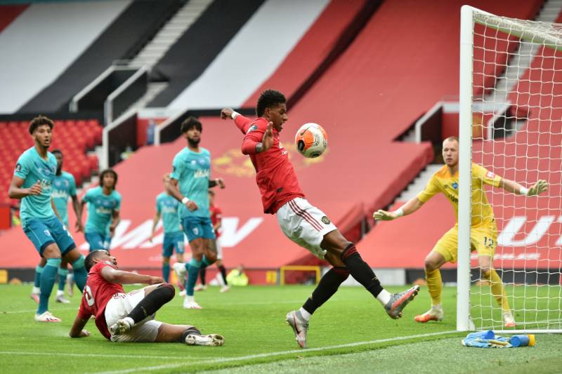 Manchester United's Marcus Rashford in action, as play resumes behind closed doors following the outbreak of the coronavirus disease (COVID-19) during the Premier League match between Manchester United and AFC Bournemouth, at Old Trafford, in Manchester, Britain, on July 4, 2020. Photo: Peter Powell/Pool via Reuters