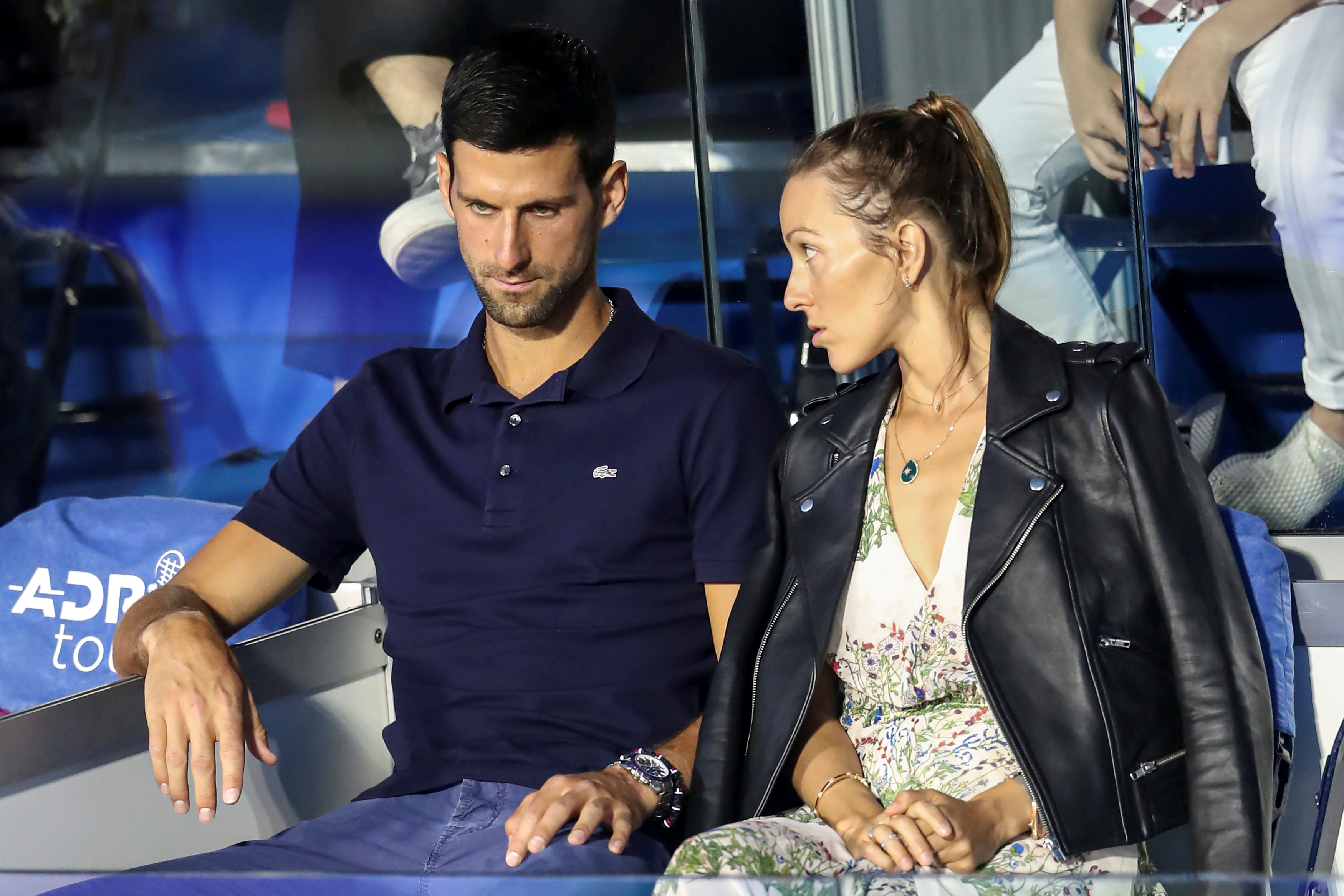 FILE PHOTO: Serbia's Novak Djokovic with his wife Jelena in the stands during Adria Tour at Novak Tennis Centre in Belgrade, Serbia, June 14, 2020. Photo: Reuters