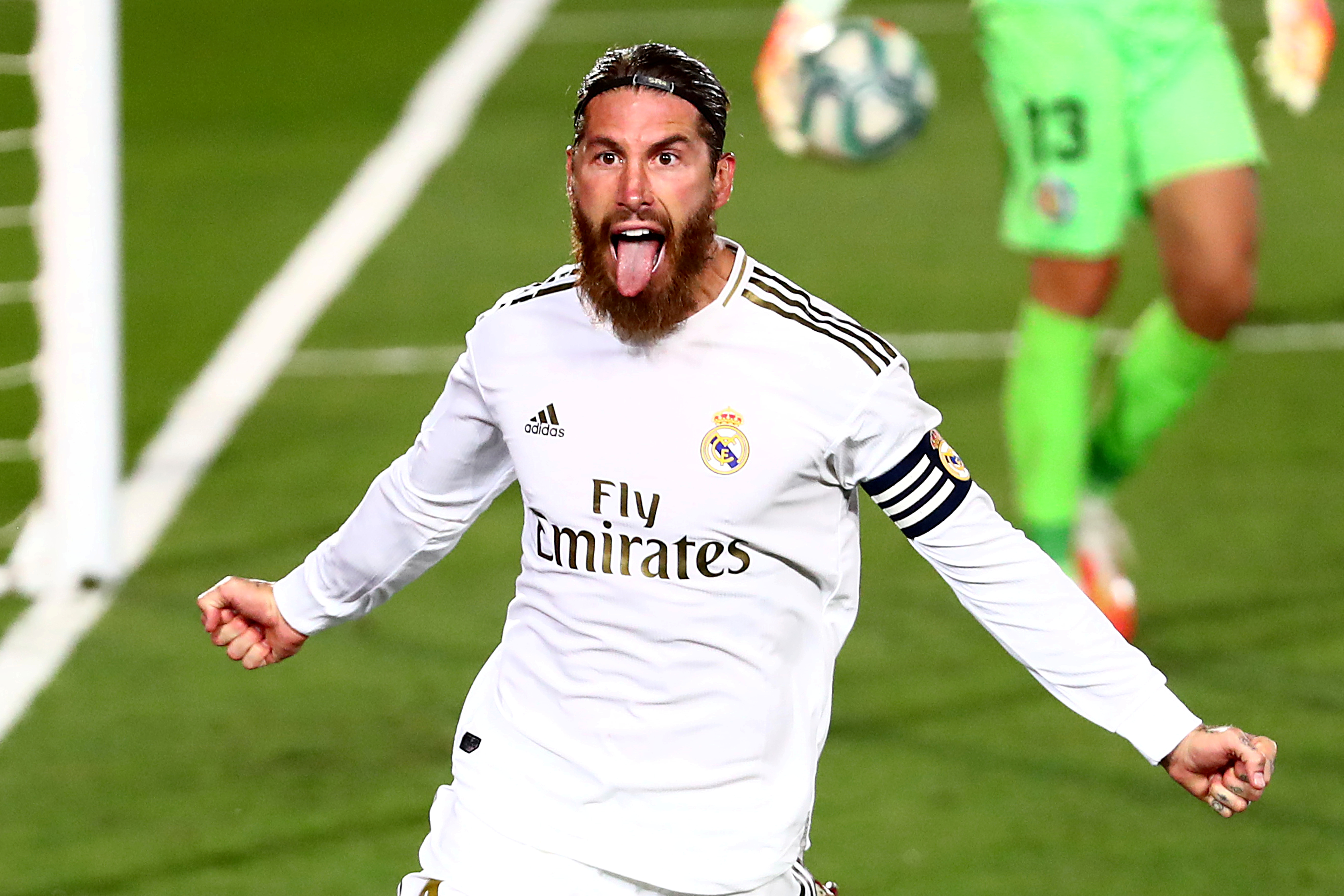 Real Madrid's Sergio Ramos celebrates scoring their first goal, as play resumes behind closed doors following the outbreak of the coronavirus disease (COVID-19) during the La Liga Santander match between Real Madrid and Getafe, at Alfredo Di Stefano Stadium, in Madrid, Spain, on July 2, 2020. Photo: Retuers