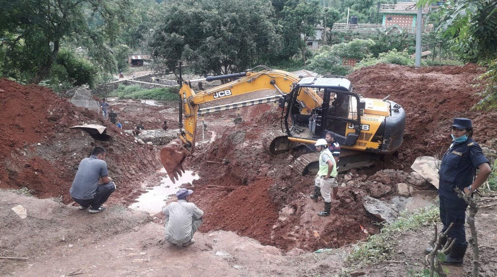 Repair works under way along the Damauli-Dumre Road section in Tanahun, on Saturday. Photo: THT