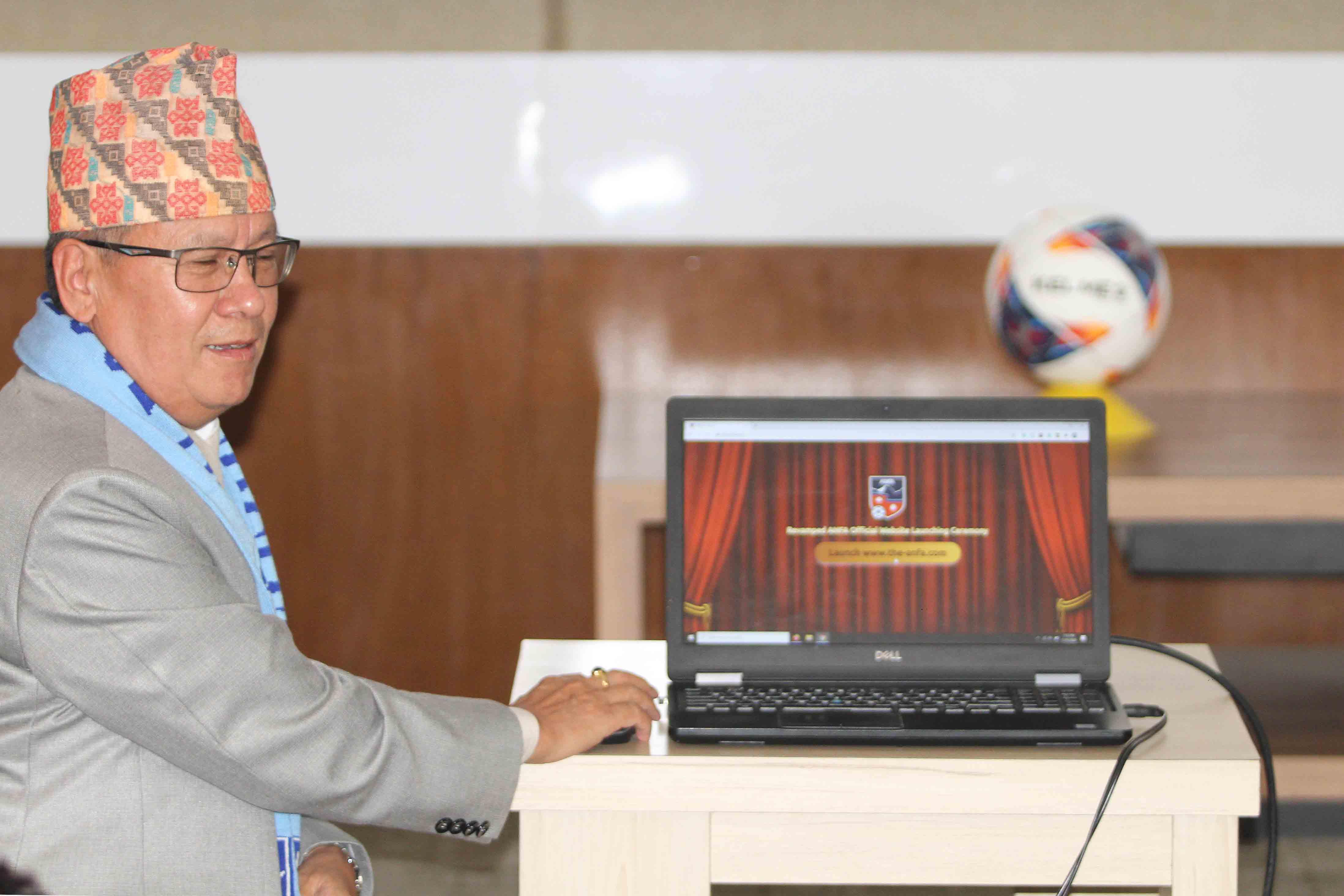 Chief Information Commissioner of Nepal Information Commission Mahendra Man Gurung unveiling the new website of the All Nepal Football Association at the ANFA Complex in Lalitpur on Wednesday.nPhoto: Udipt Singh Chhetry/THT