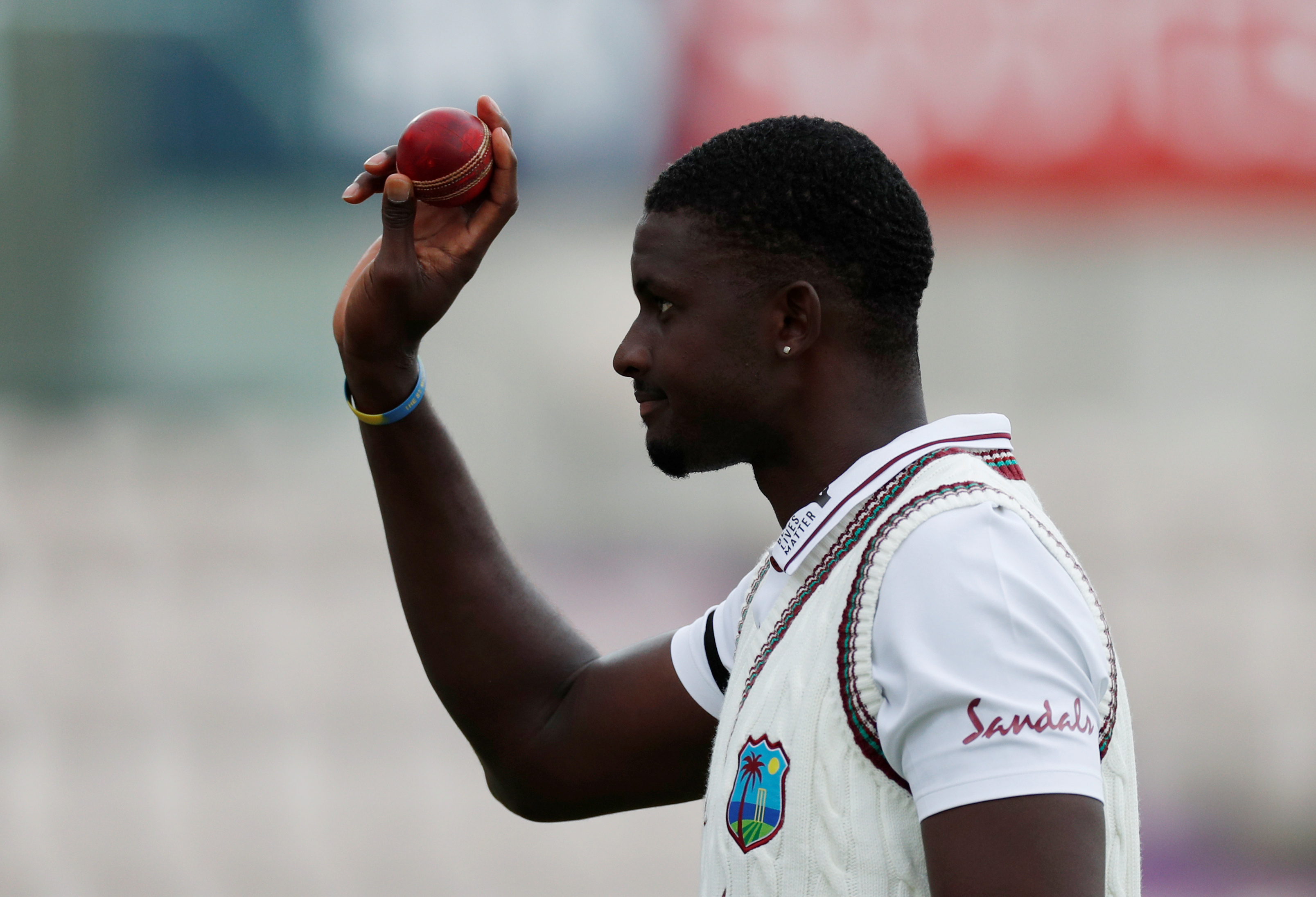 West Indies' Jason Holder celebrates with the ball after England's first innings, as play resumes behind closed doors following the outbreak of the coronavirus disease (COVID-19). Photo: Reuters   