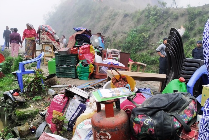 Locals affected by landslides preparing to relocate to safer place in Bhojpur district, on Sunday, July 12, 2020. Photo: Niroj Koirala/THT