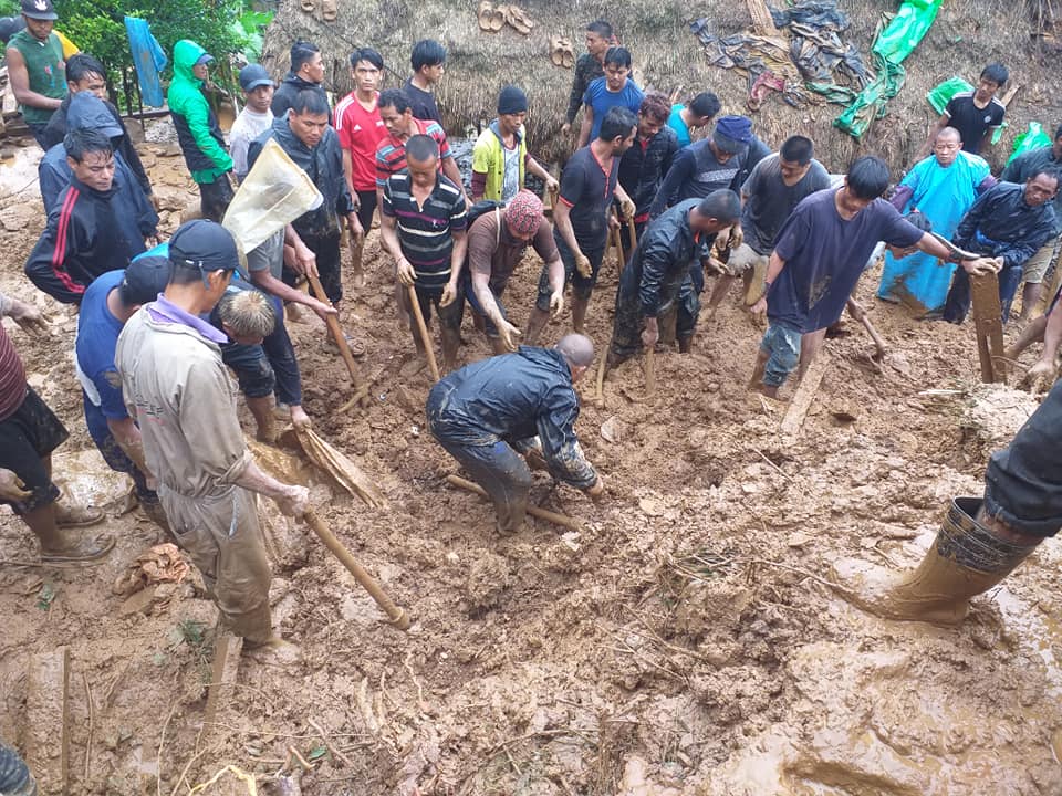 FILE - Locals and security personnel searching for missing persons in landslides, in Tanahun district, on Monday, July 13, 2020. Photo: Madan Wagle/THT
