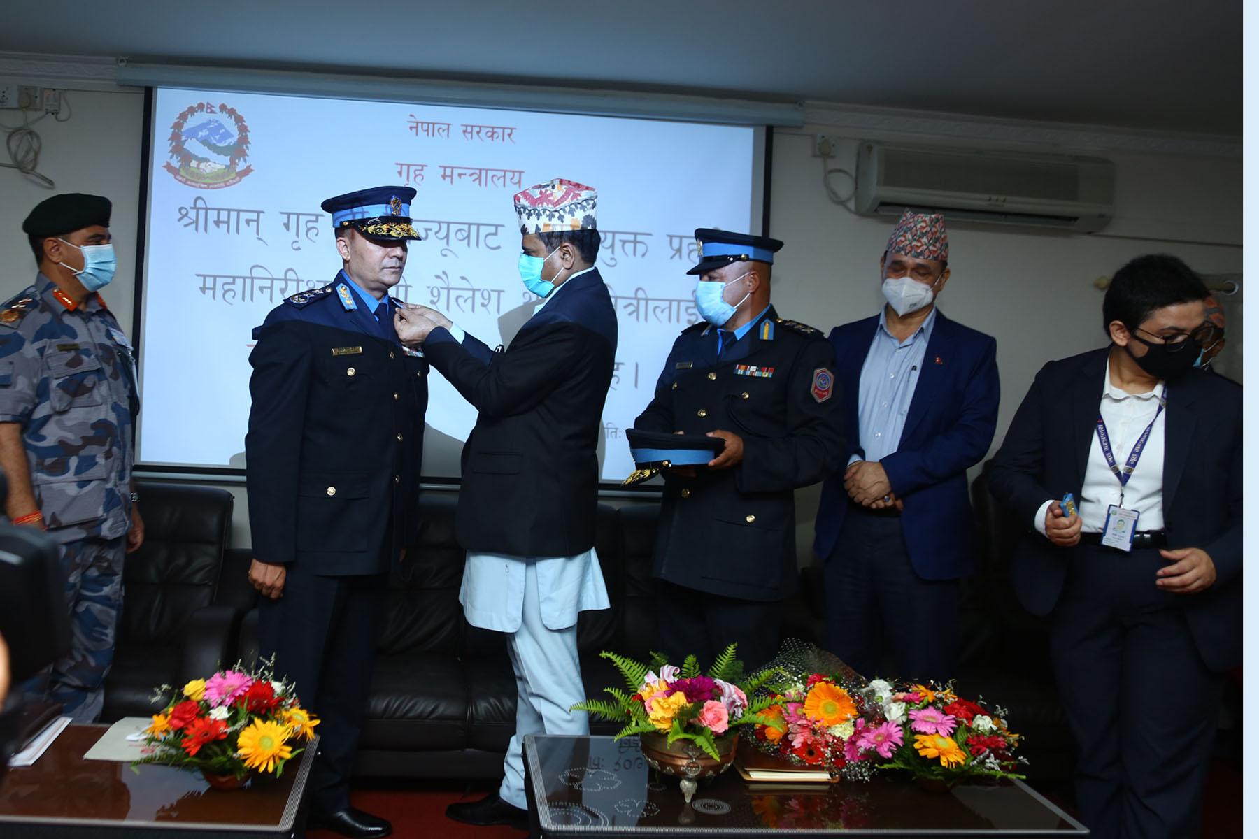 Home Secretary Maheshwor Neupane conferred insignia on newly appointed Inspector General of Police Shailesh Thapa Kshetri amid a function organised at the Ministry of Home Affairs on Thursday, July 09, 2020. Photo: RSS