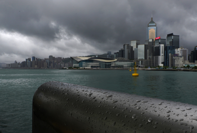 Rain droplets line a railing along the waterfront of Victoria Harbour in Hong Kong Wednesday, Aug. 19, 2020. Photo: AP