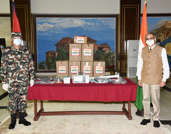 Ambassador of India to Nepal Vinay Kwatra presents aid to Nepal Army. Photo Courtesy: Twitter
