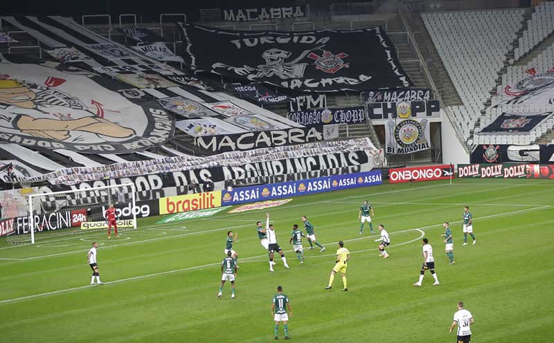 Players of Corinthians, in white, and Palmeiras play the Sao Paulo league first leg final soccer match at the Arena Corinthians stadium in Sao Paulo, Brazil, on Wednesday, August 5, 2020. The match is being played without spectators to curb the spread of COVID-19. Photo: AP