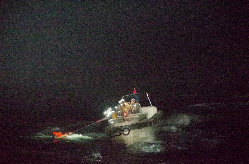 A Filipino crew member believed to be onboard Gulf Livestock 1, a cargo ship carrying livestock and dozens of crew members that went missing after issuing a distress signal due to Typhoon Maysak, is rescued by a Japan Coast Guard boat during their search and rescue operation at the East China Sea, to the west of Amami Oshima island in southwestern Japan, in this handout photo taken on September 2, 2020 and provided by Japan Coast Guard. Picture taken September 2, 2020. 10th Regional Coast Guard Headquarters - Japan Coast Guard/Handout via Reuters