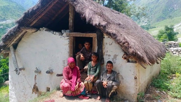 Kidney victim Bire Sharkiu2019s family sitting near his house at Budhanilakantha Municipality, in Bajura, on Saturday. Photo: THT