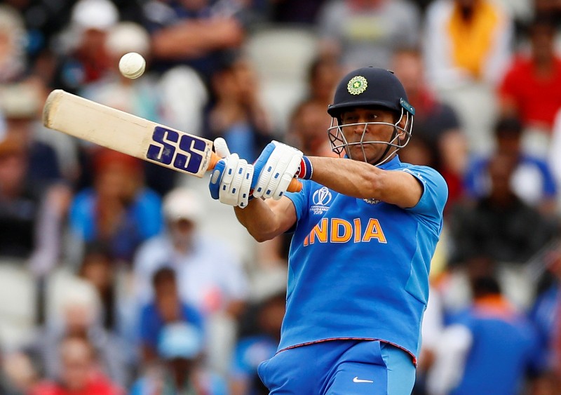 FILE - India's MS Dhoni in action during the ICC Cricket World Cup Semi Final match between India and New Zealand, at Old Trafford, in Manchester, Britain, on July 10, 2019. Photo: Action Images via Reuters
