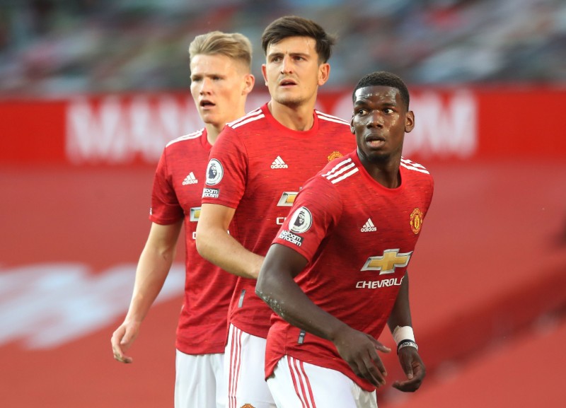 Manchester United's Paul Pogba, Harry Maguire and Scott McTominay during the Premier League match between Manchester United and Crystal Palace, at Old Trafford, in Manchester, Britain, on September 19, 2020. Photo: Pool via Reuters