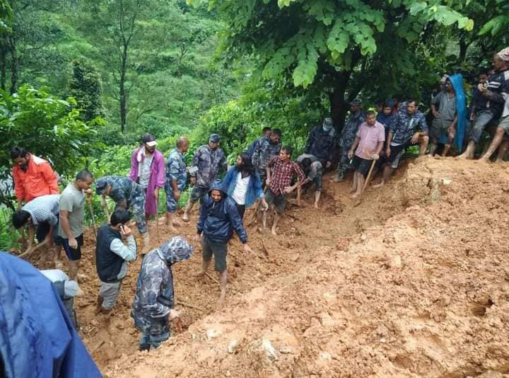 Security Personnel and locals search for the missing people in the Tamagi landslide in Waling Municipality-14, Syangja, on Thursday, September 24, 2020. Photo: Rishi Baral/THT