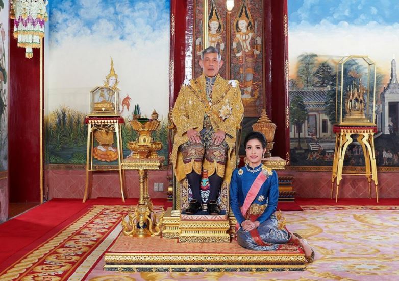 Thailand's King Maha Vajiralongkorn and General Sineenat Wongvajirapakdi, the royal noble consort pose at the Grand Palace in Bangkok, Thailand, in this undated handout photo obtained by Reuters September 2, 2020. Photo: Reuters