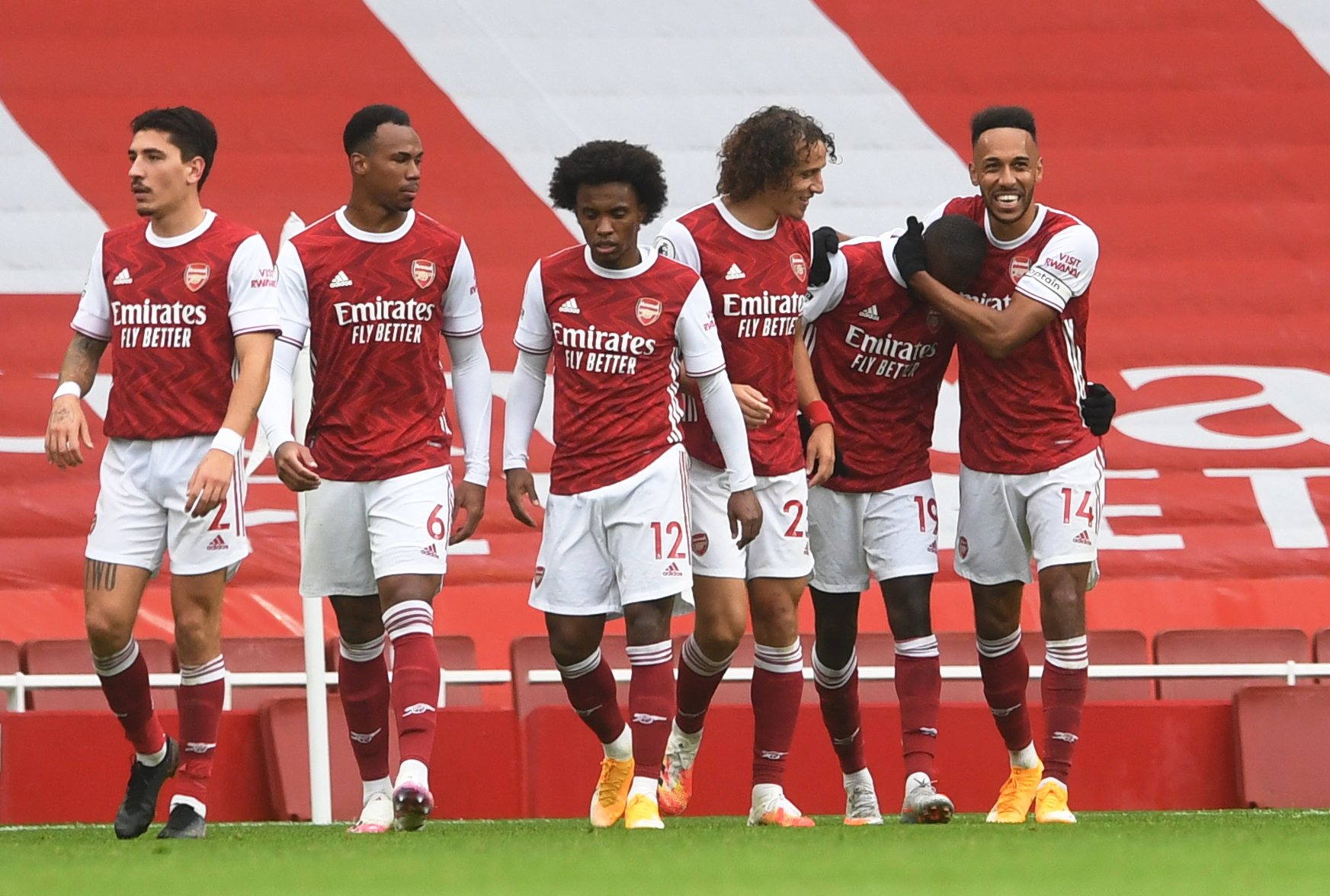 Arsenal's Nicolas Pepe celebrates scoring their second goal with teammates. Photo: Reuters 