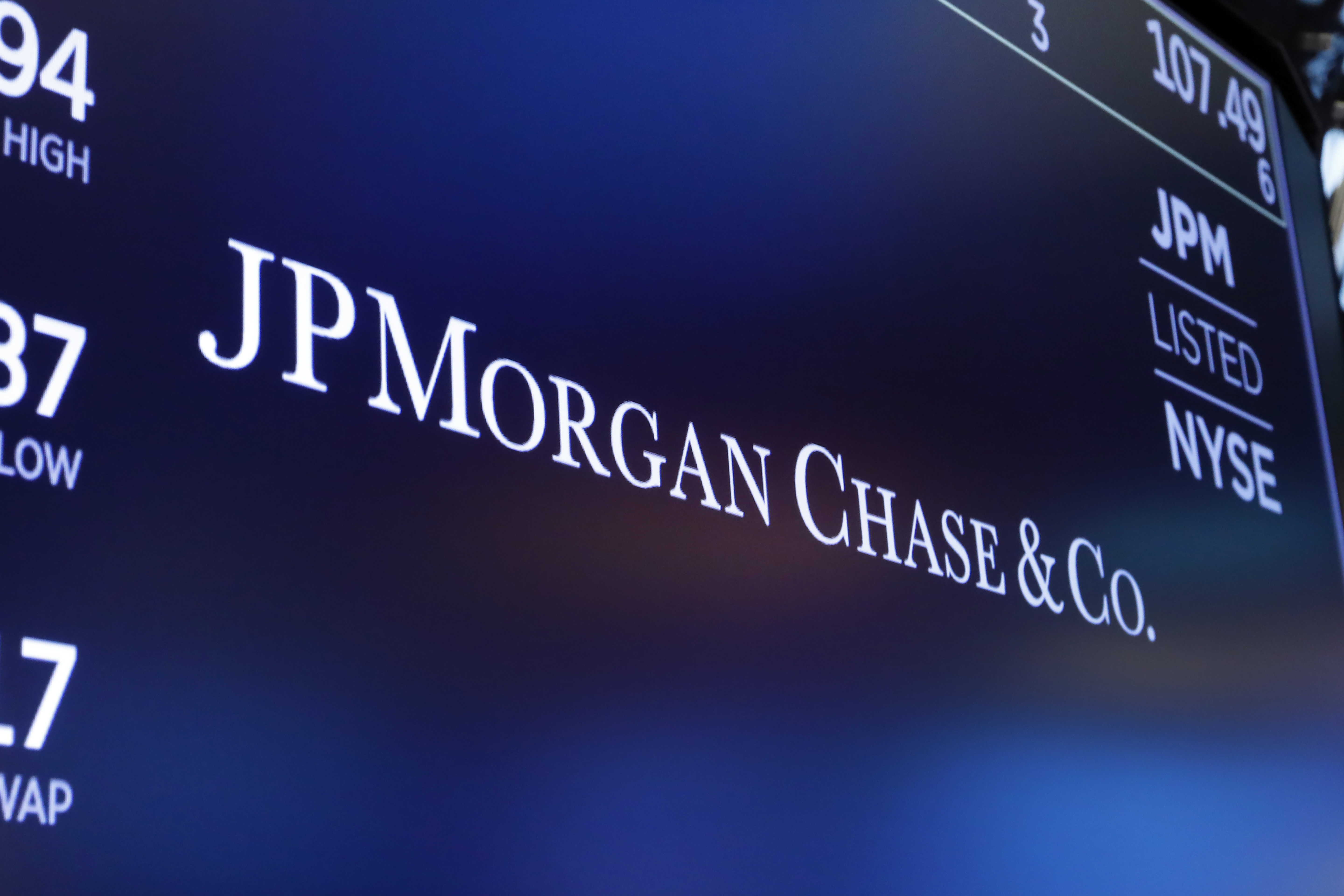 FILE - In this Aug. 16, 2019, file photo, the logo for JPMorgan Chase &amp; Co. appears above a trading post on the floor of the New York Stock Exchange in New York. JPMorgan Chase said Thursday, Oct. 8, 2020 it will extend billions in loans to Black and Latino homebuyers and small business owners in an expanded effort toward fixing what the bank calls u201csystemic racismu201d in the countryu2019s economic system. Photo: AP