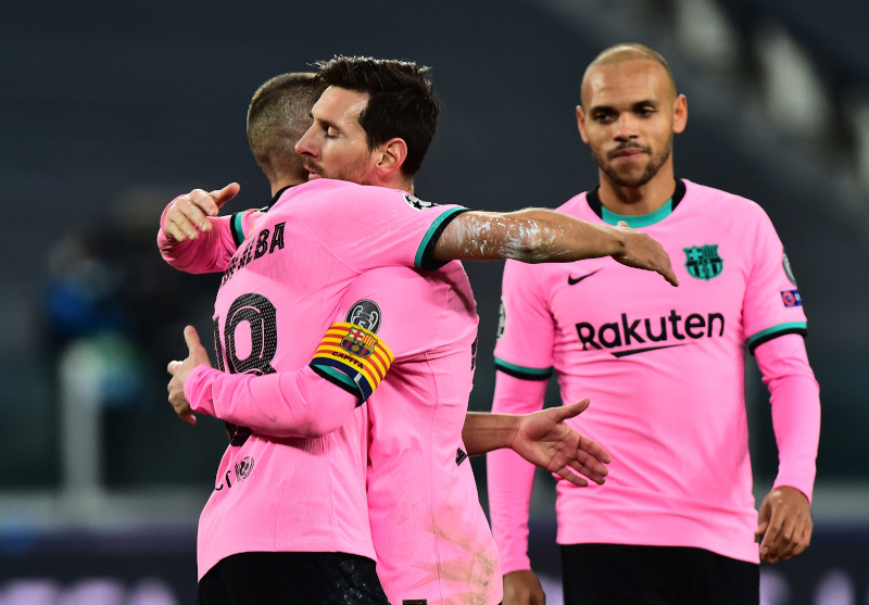 Barcelona's Lionel Messi celebrates scoring their second goal with teammates during the Champions League  Group G match between Juventus and FC Barcelona, at  Allianz Stadium, in Turin, Italy, on October 28, 2020. Photo: Reuters