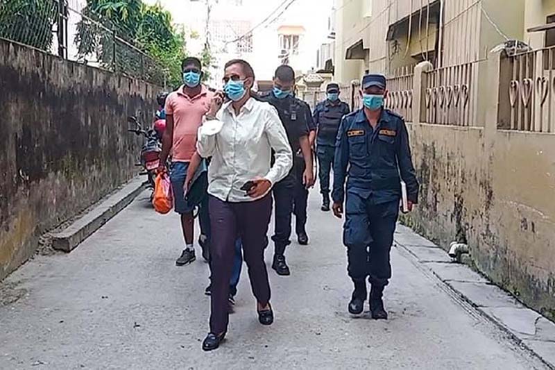 Police personnel deployed from Parsa District Police Office (DPO) under the command of Superintendent of Police (SP) Ganga Panta on their way to Ganesh Apartment in Birgunj Metropolitan City-6, Parsa district, on Saturday, October 17, 2020. Photo: Ram Sarraf/THT
