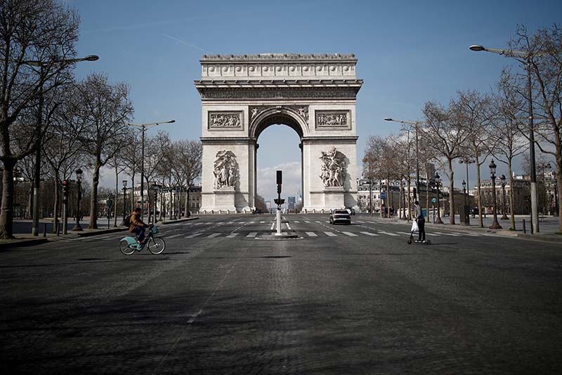 FILE - A view shows the deserted Arc de Triomphe as lockdown is imposed to slow the spreading of the coronavirus disease (COVID-19) in Paris, France, March 18, 2020. Photo: Reuters