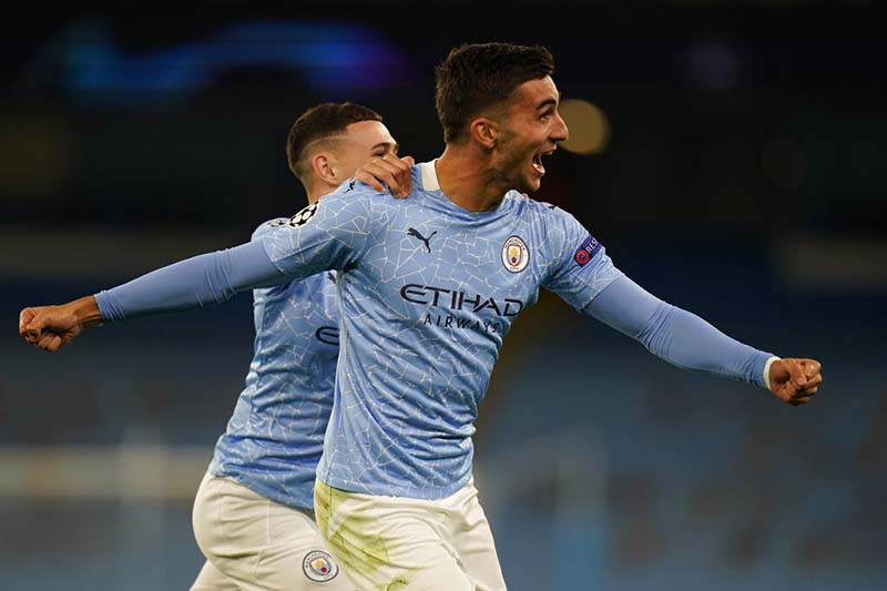 Manchester City's Ferran Torres celebrates after scoring his side's third goal during the Champions League group C soccer match between Manchester City and FC Porto at the Etihad stadium in Manchester, England, on Wednesday, October 21, 2020. Photo: Tim Keeton/Pool via AP