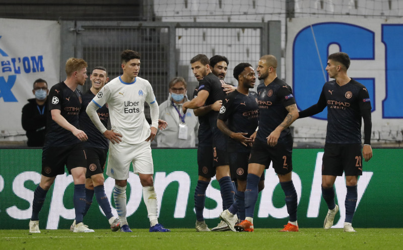 Manchester City's Ilkay Gundogan celebrates scoring their second goal with teammates during the Champions League Group C match between Olympique Marseille and Manchester City, at Orange Velodrome, in Marseille, France, on October 27, 2020. Photo: Reuters