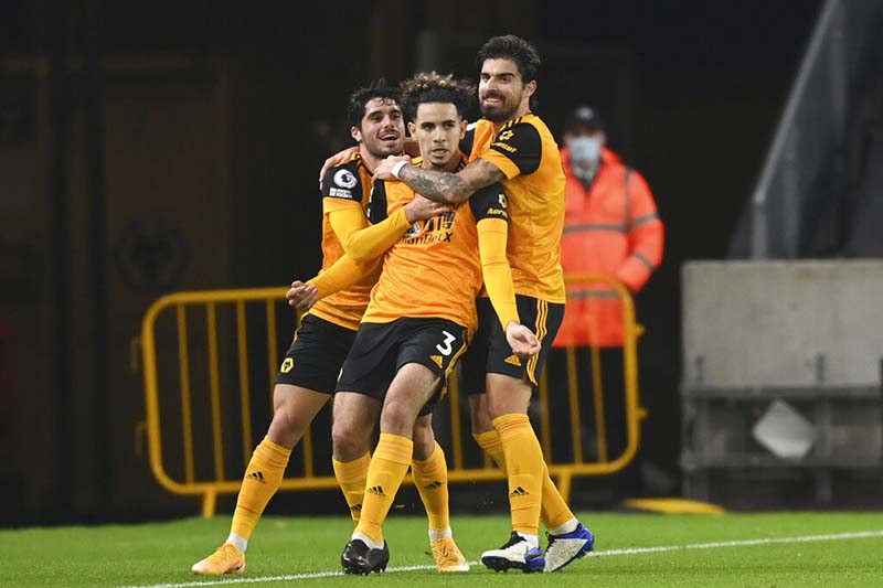 Wolverhampton Wanderers' Rayan Ait-Nouri, center, celebrates after scoring his side's first goal during the English Premier League soccer match between Wolverhampton Wanderers and Crystal Palace at the Molineux Stadium in Wolverhampton, England, on Friday, October 30, 2020. Photo: Michael Regan/Pool via AP