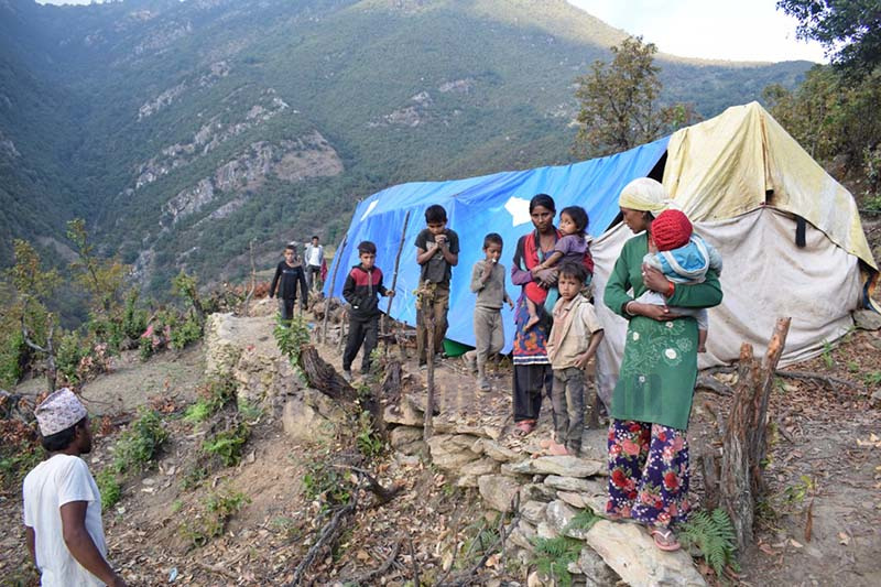 This image shows children and women belonging to the families dispaced by landslide, outside their makeshift tent in Gothgaun Talagaun of Barekot Rural Municipality in Jajarkot district, on Thursday, October 22, 2020. Photo: Dinesh Shrestha/THT