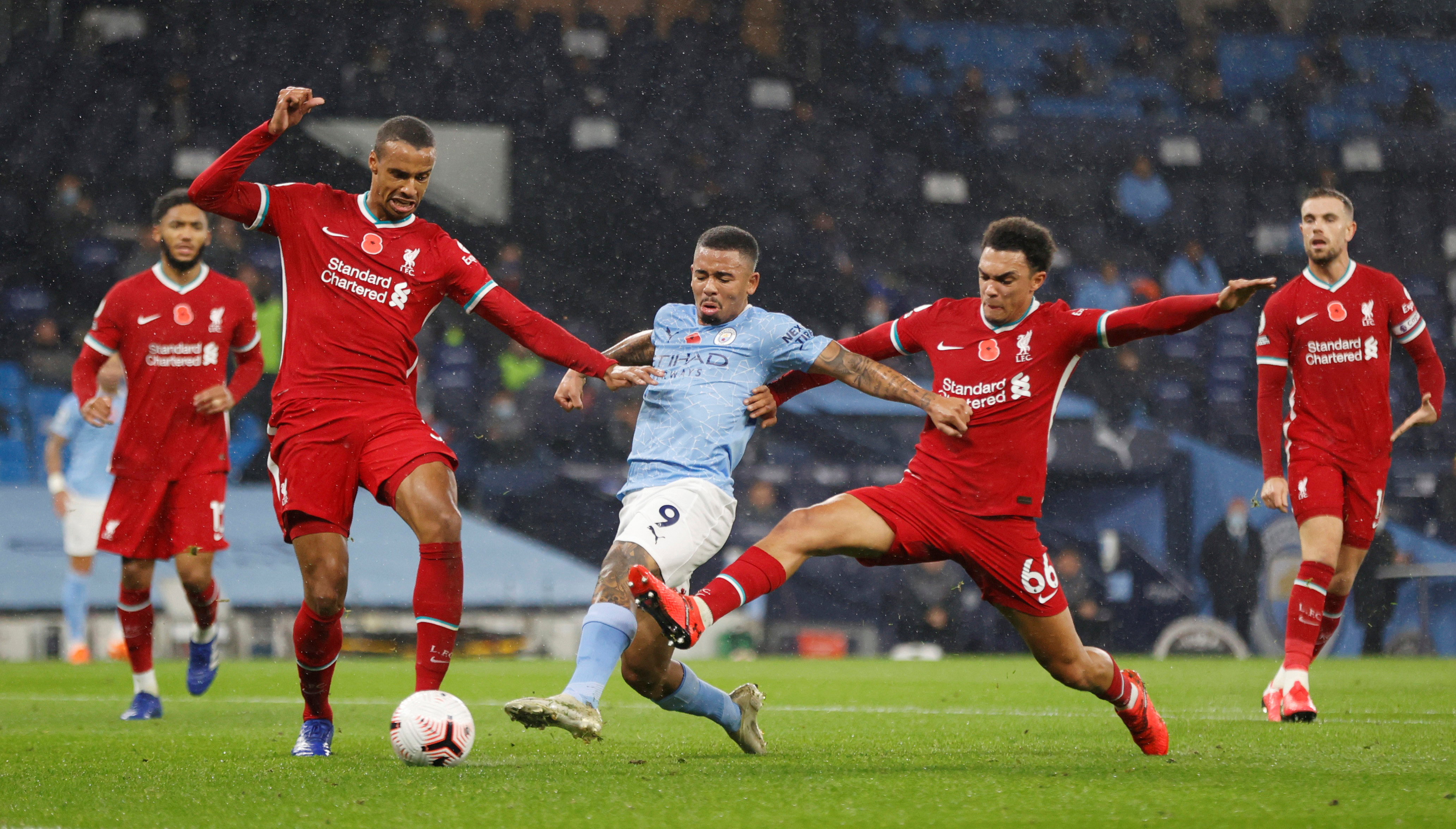 Manchester City's Gabriel Jesus scores their first goal  during the Premier League match between Manchester City and Liverpool, at Etihad Stadium, in  Manchester, Britain, on November 8, 2020. Photo: Pool via Reuters