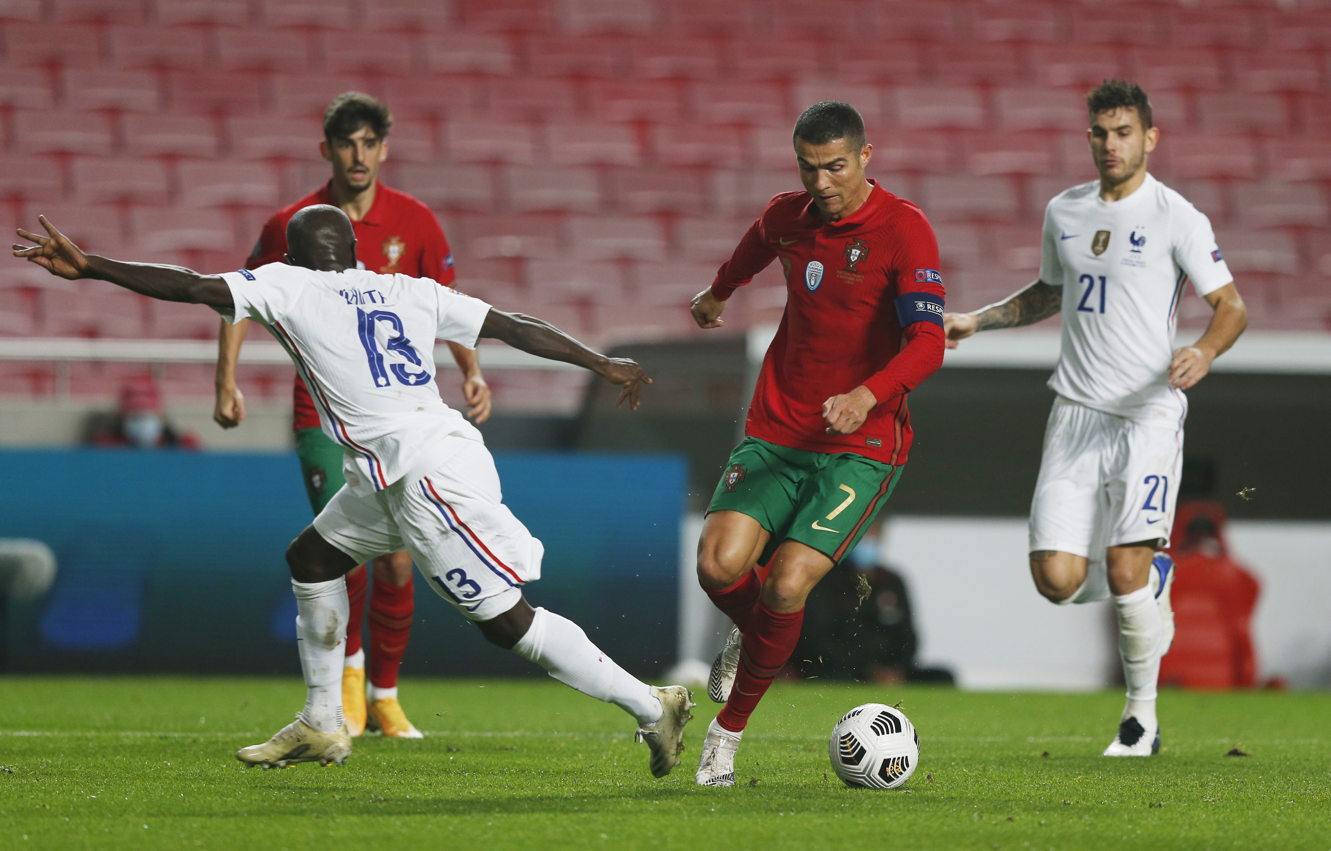 Portugal's Cristiano Ronaldo in action with France's N'Golo Kante. Photo: Reuters 